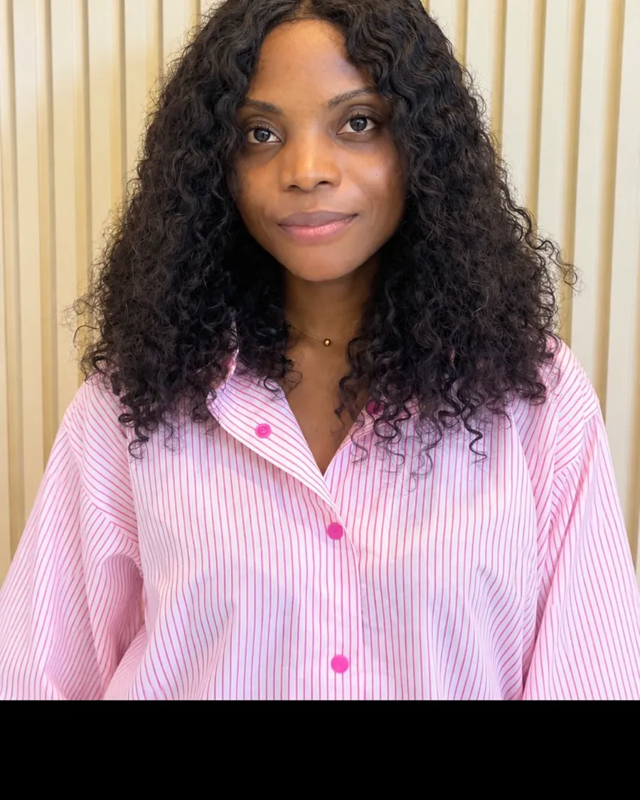 Professional portrait used to keep the Baaraku virtual assistant experience centered on people rather than task lists.